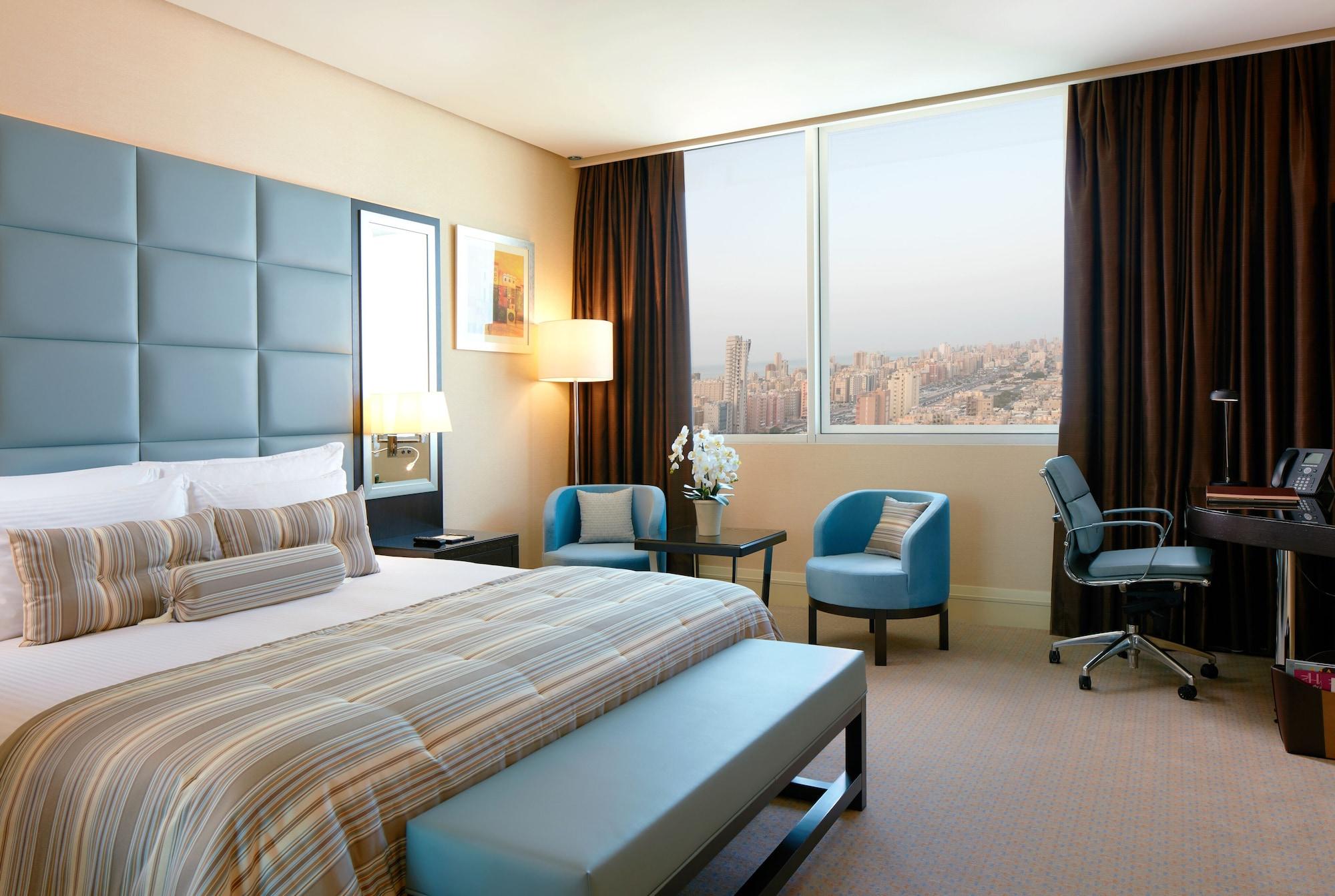 มิลเลเนียม โฮเต็ล แอนด์ คอนเวนชั่น เซ็นเตอร์ คูเวต Hotel Kuwait City ภายนอก รูปภาพ A room at the hotel