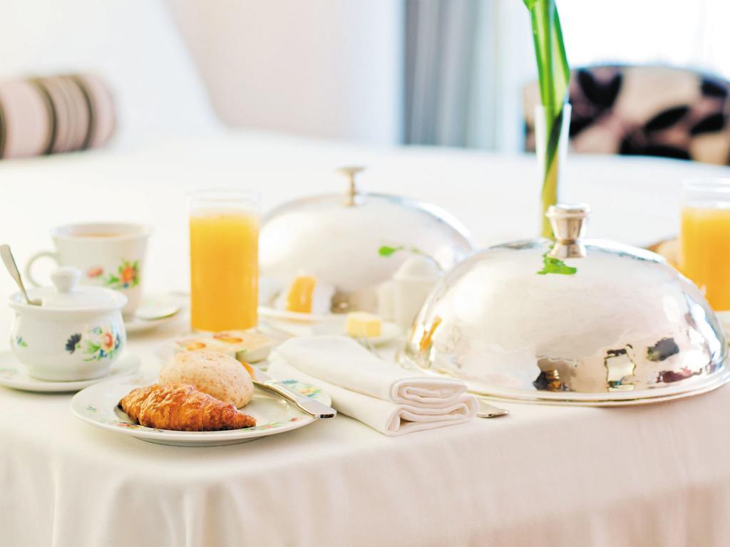 มิลเลเนียม โฮเต็ล แอนด์ คอนเวนชั่น เซ็นเตอร์ คูเวต Hotel Kuwait City ภายนอก รูปภาพ Room service